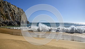 A lonely beach in the Algarve. IV