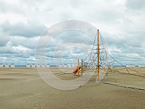 Lonely beach with climbing frame