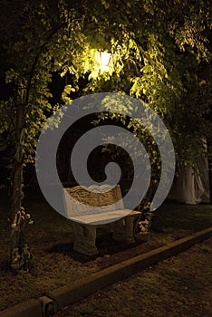 Lonely bench in the dark