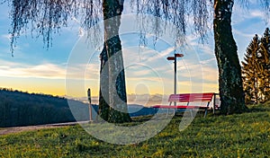 Lonely bench and mountains