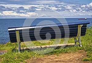 Lonely bench at Santander bay