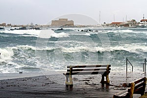 Lonely bench on a stormy day in Paphos