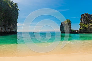 a lonely boat in the Andaman Sea against the backdrop