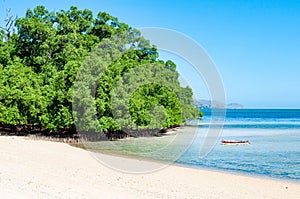 A lonely boat at beach area, Hera Timor Leste photo