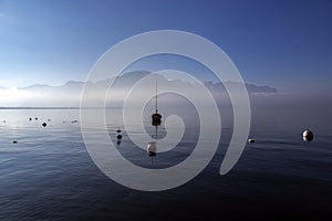 Lonely boat on Lake Leman or Lake of Geneva