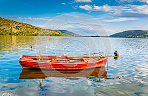 a lonely boat on lake orestiada/kastoria in Greece