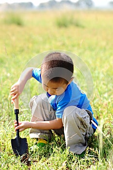 Lonely boy in the field