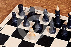 Lonely brave white pawn attack the whole black army