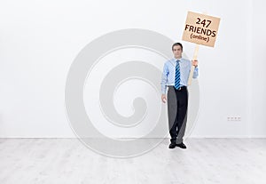 Lonely businessman with many online friends