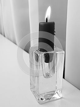 a lonely candle is burning