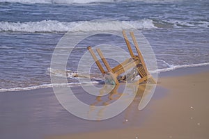Lonely chair on the beach of Maayan Zvi