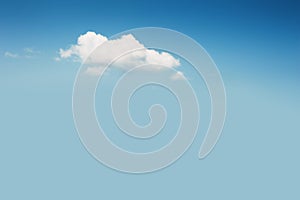 Lonely cloud in the blue sky. Abstract nature background