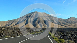 Lonely country road, early morning on the Canary Island Lanzarote