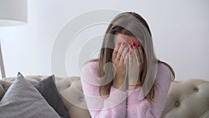 Lonely desperate adult woman crying at home