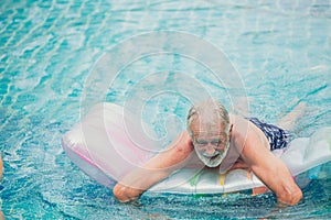 Lonely elder, Old man playing at pool alone at nursing home