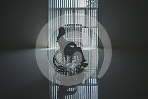 Lonely elderly man looks sad in the wheelchair