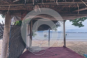 Lonely gazebo on the beach of tropical island Nusa Lembongan, Bali, Indonesia.