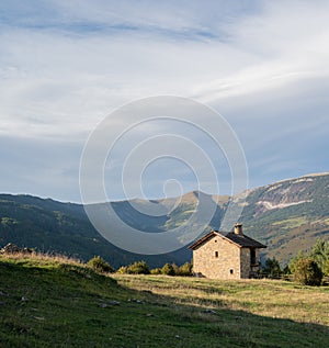 A lonely house in a mountain meadow. Calm vacation