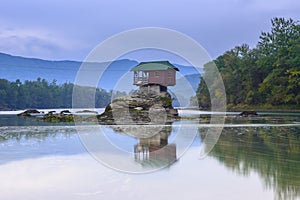 Lonely house on the river Drina in Bajina Basta, Serbia photo