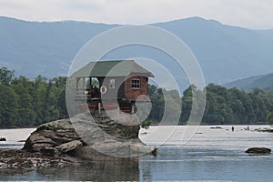 Lonely house on the river Drina in Bajina Basta, Serbia. Cabin, forest.