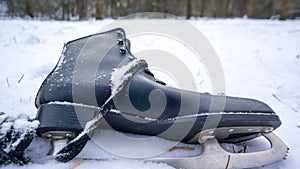 Lonely ice skate in snow