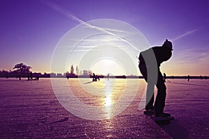 Lonely ice skater photo