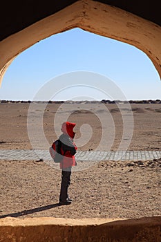Lonely lady in desert