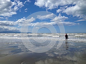 Lonely man on the beach