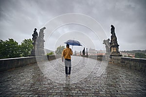 Lonely man in heavy rain