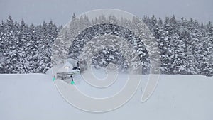 Lonely Man Snowmobiling in The Powder Snow