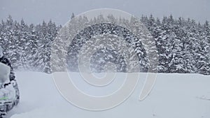 Lonely Man Snowmobiling in The Powder Snow