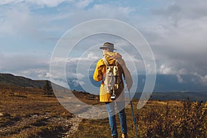 Lonely man strolling outdoors, loneliness concept