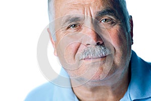 Lonely old man with gray hair and mustache