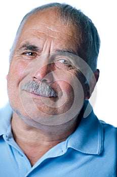 Lonely old man with gray hair and mustache