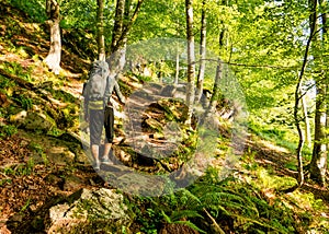 Lonely Pilgrim with backpack walking the Camino de Santiago in Spain, Way of St James photo