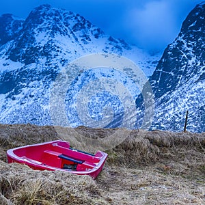 Lonely Red Fishing Boat At Skagsanden Beach in Norway