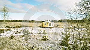 Lonely residential house among fallen snow