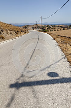 Lonely road with shadows