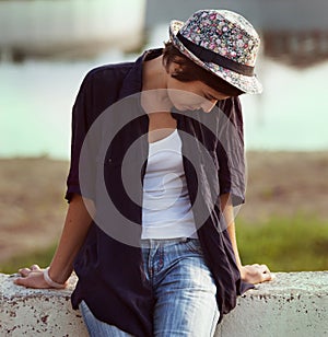Lonely sad girl in hat