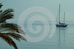 Lonely sailboat on the mediterranean sea, tranquility scenery on a sea