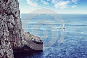 Lonely sailboat sailing on the sea