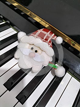 Lonely santa in piano
