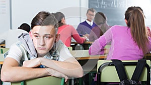 ï»¿lonely school pupil sitting