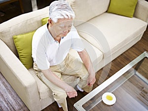 Lonely senior asian man