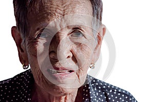 Lonely senior woman smiling in camera