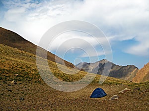 Lonely tent in mountains , mount Alamkuh , Iran