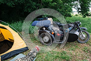 Lonely travel on sidecar, rest from civilization