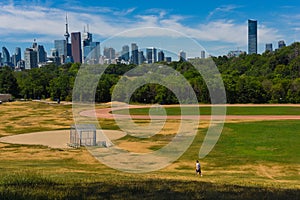 Lonely walker in riverdale park