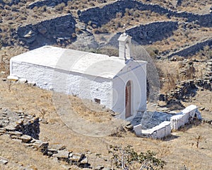 Lonely white church on mountain slopes