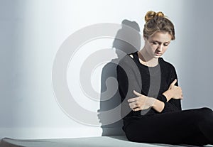 Lonely woman with anorexia nervosa photo